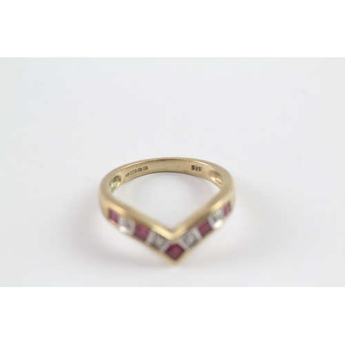 153 - 9ct gold ruby and diamond wishbone dress ring Size M