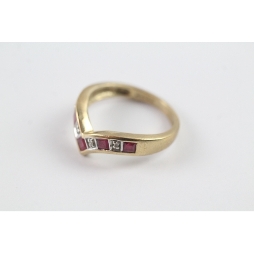 153 - 9ct gold ruby and diamond wishbone dress ring Size M