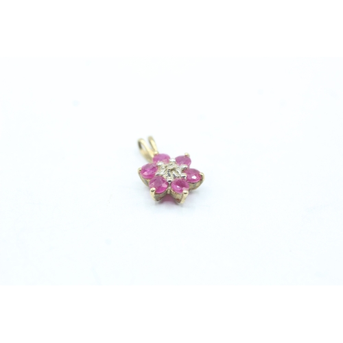 156 - 9ct gold ruby and diamond floral earring and pendant set (1.4g)