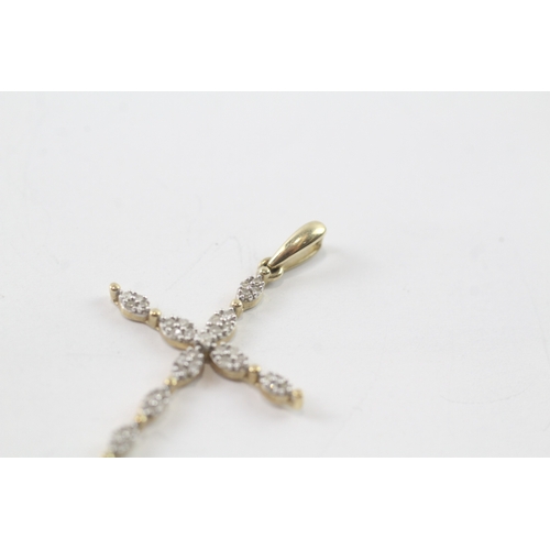 16 - 9ct gold diamond cross pendant (1.2g)