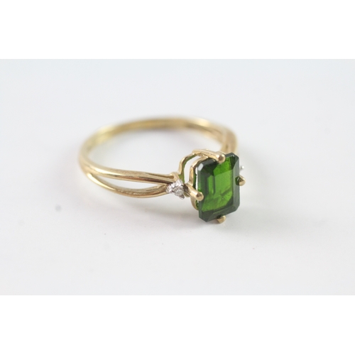 182 - 9ct gold diamond and green gemstone dress ring Size P