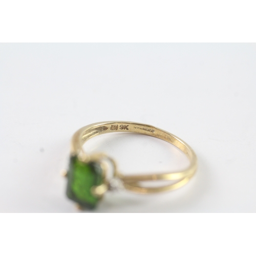 182 - 9ct gold diamond and green gemstone dress ring Size P