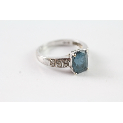 201 - 9ct gold diamond and blue gemstone dress ring Size O