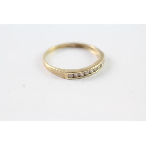 212 - 9ct gold channel set diamond half eternity dress ring