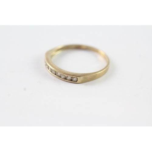 212 - 9ct gold channel set diamond half eternity dress ring