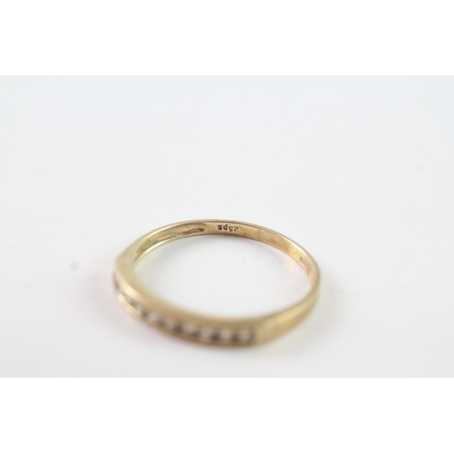 212 - 9ct gold channel set diamond half eternity dress ring