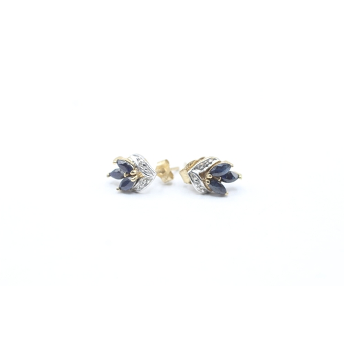 217 - 2 x 9ct gold sapphire and ruby stud earrings (2.4g)