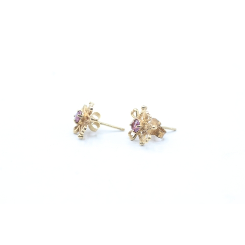 217 - 2 x 9ct gold sapphire and ruby stud earrings (2.4g)