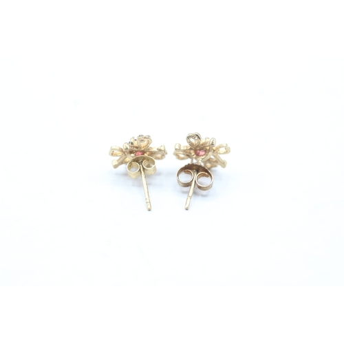 217 - 2 x 9ct gold sapphire and ruby stud earrings (2.4g)