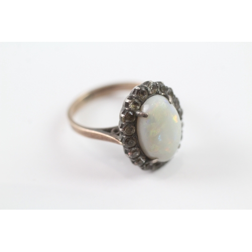 220 - 9ct gold opal and diamond halo ring (3.9g) as seen Size M