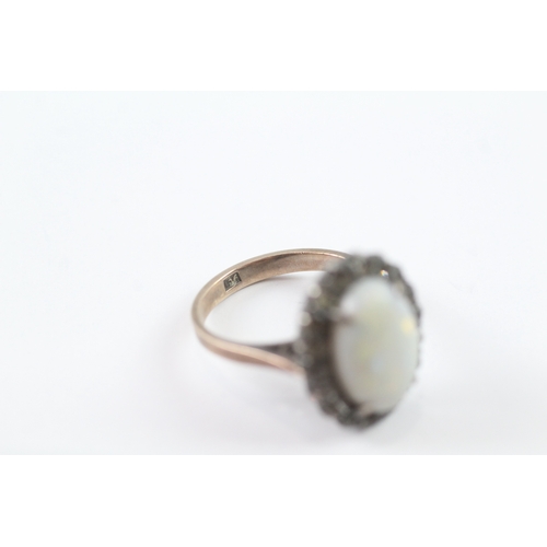 220 - 9ct gold opal and diamond halo ring (3.9g) as seen Size M