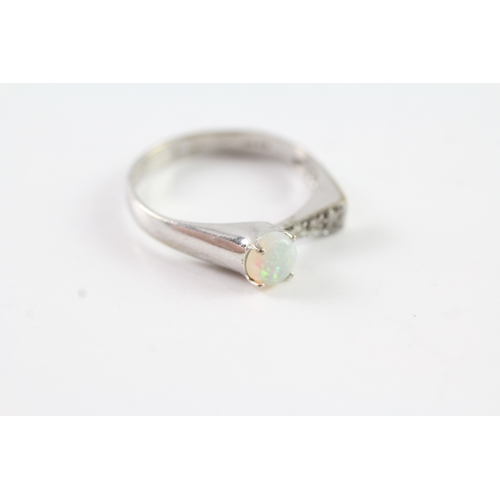 222 - 9ct gold opal and diamond ring (2g) Size N 1/2