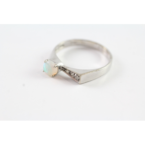 222 - 9ct gold opal and diamond ring (2g) Size N 1/2