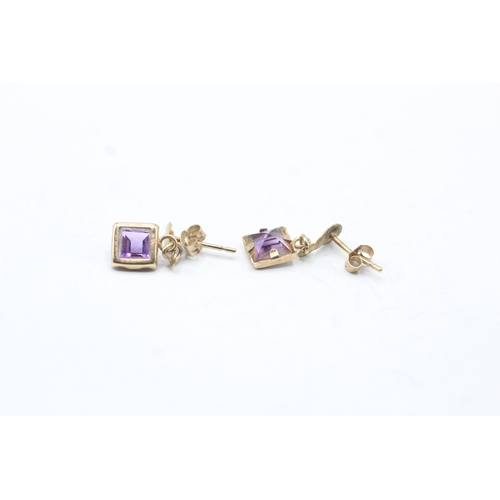 224 - 2 x 9ct gold amethyst stud earrings (1.1g)