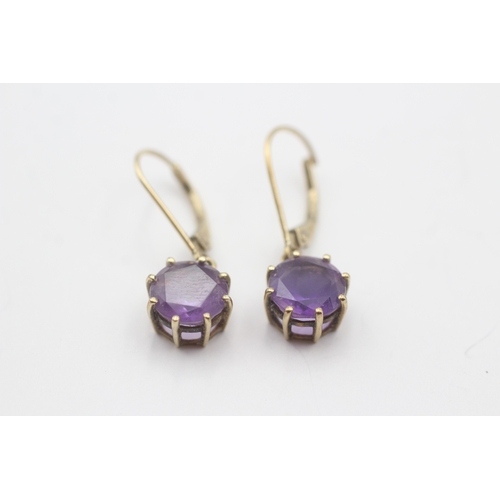 227 - 9ct gold claw set amethyst lever back earrings (2.3g)