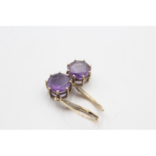 227 - 9ct gold claw set amethyst lever back earrings (2.3g)