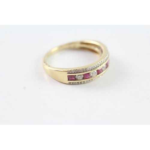 240 - 18ct gold diamond and ruby channel setting ring (3.8g) Size P