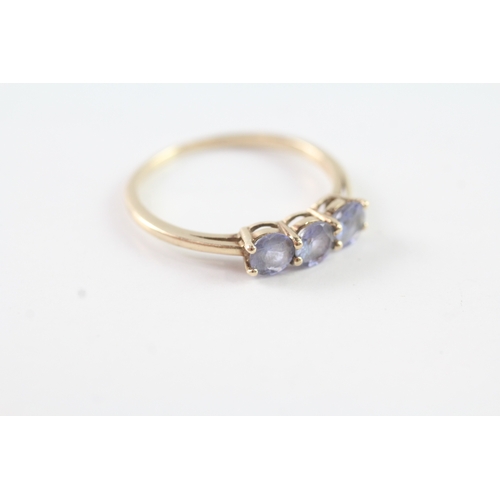 241 - 9ct gold tanzanite trilogy ring (1.8g) Size S