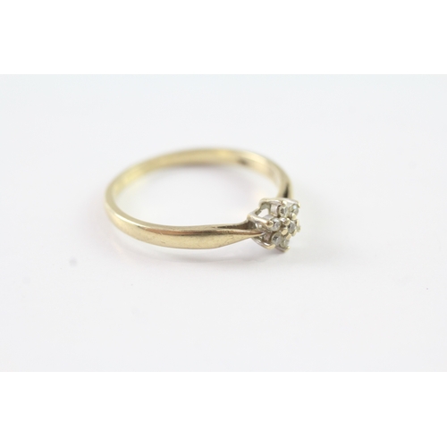 242 - 9ct gold diamond floral ring (1.8g) Size Q