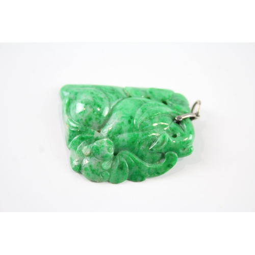 303 - Carved Jade Pendant w/ Sterling Silver Bail 15g