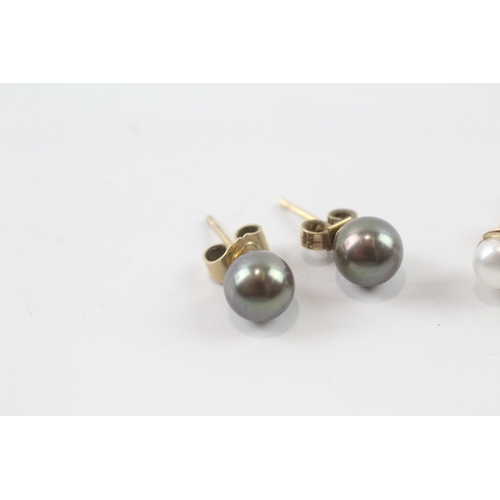 34 - 2 x 9ct gold cultured pearl stud earrings (3.9g)