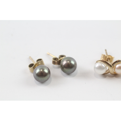 34 - 2 x 9ct gold cultured pearl stud earrings (3.9g)