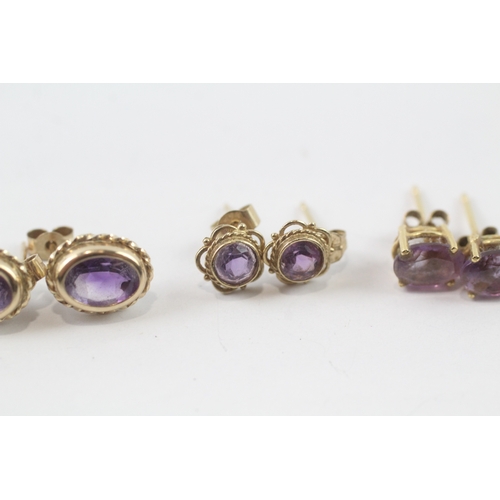 43 - 3 x 9ct gold amethyst single stone stud earrings (2.7g)