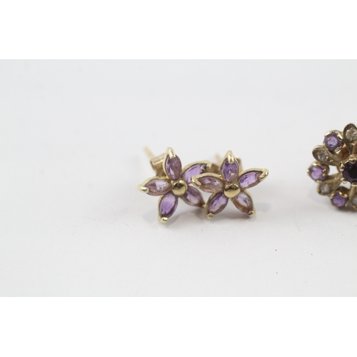 44 - 2 x 9ct gold amethyst and white gemstone stud earrings (3g)