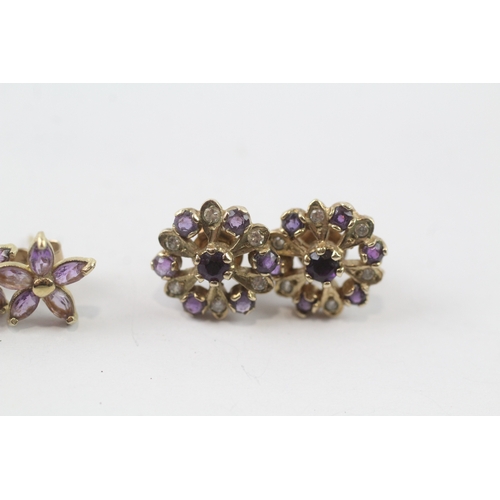 44 - 2 x 9ct gold amethyst and white gemstone stud earrings (3g)