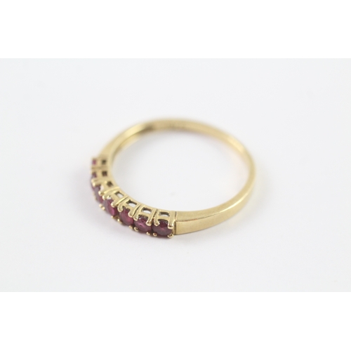 5 - 18ct gold ruby seven stone dress ring Size S