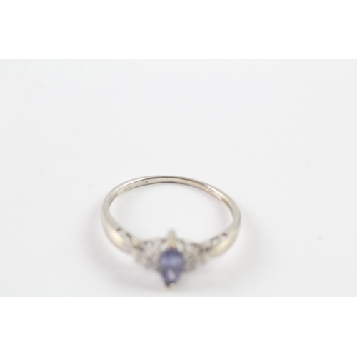 50 - 9ct gold tanzanite and diamond ring Size Q