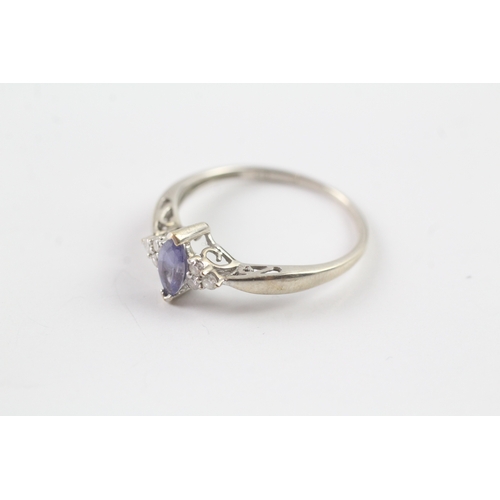 50 - 9ct gold tanzanite and diamond ring Size Q