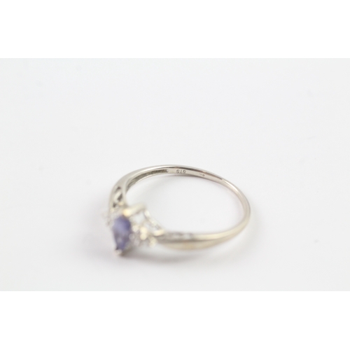 50 - 9ct gold tanzanite and diamond ring Size Q