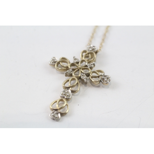 68 - 9ct gold diamond patterned cross pendant necklace (2.2g)