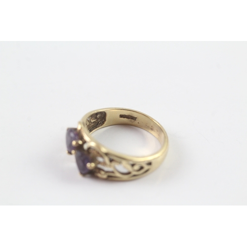 71 - 9ct gold two stone amethyst ring Size L 1/2