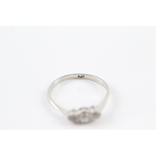 74 - .900 platinum diamond trilogy ring Size Q 1/2