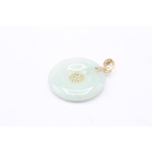 86 - 2 x 9ct gold lavender and green jade pendants (8.2g)