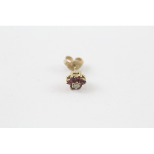 93 - 9ct gold diamond and ruby flower stud earrings (1.2g)