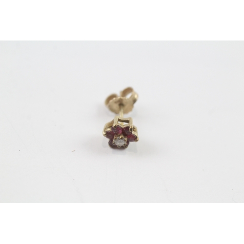 93 - 9ct gold diamond and ruby flower stud earrings (1.2g)