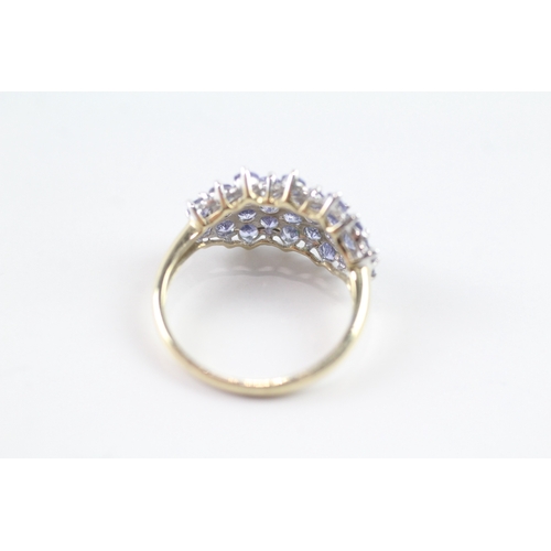 96 - 9ct gold parve set tanzanite dress ring Size P