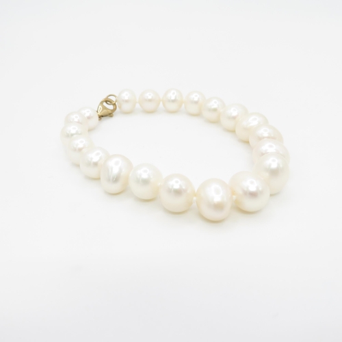 148 - 2 x 9ct gold jade and pearl beaded bracelets (37.8g)