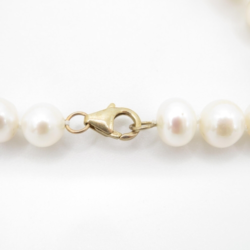 148 - 2 x 9ct gold jade and pearl beaded bracelets (37.8g)