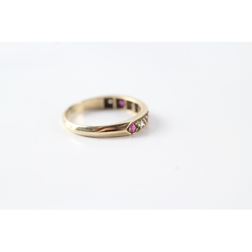 104 - 9ct gold ruby and diamond half eternity dress ring (1.6g) Size L