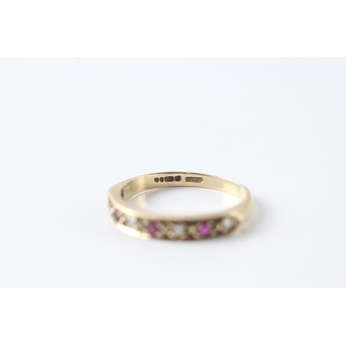 104 - 9ct gold ruby and diamond half eternity dress ring (1.6g) Size L