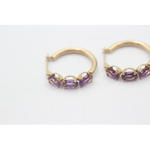 106 - 2 x 9ct gold amethyst earrings (2.5g)