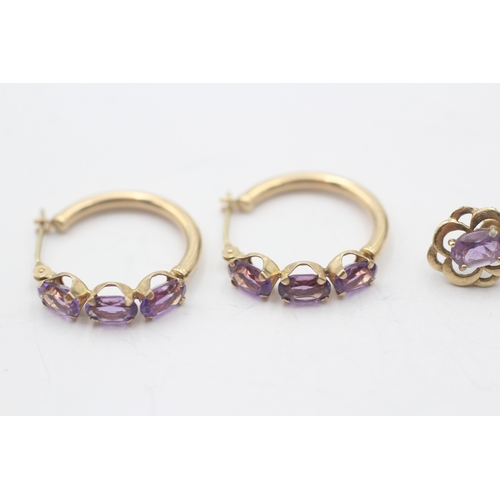 106 - 2 x 9ct gold amethyst earrings (2.5g)