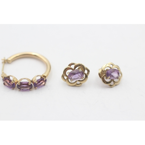 106 - 2 x 9ct gold amethyst earrings (2.5g)