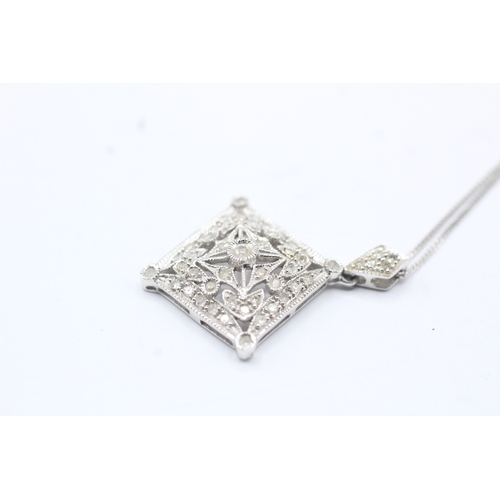 108 - 9ct gold diamond set pendant on chain (3g)