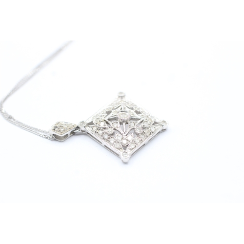 108 - 9ct gold diamond set pendant on chain (3g)