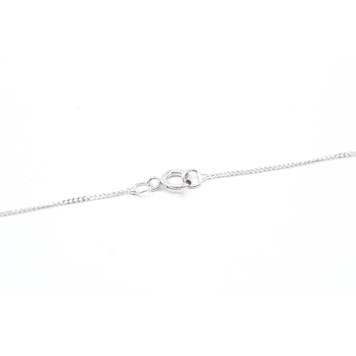 108 - 9ct gold diamond set pendant on chain (3g)